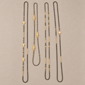 NALA — Composition de 4 sautoirs en cristal et pierres naturelles